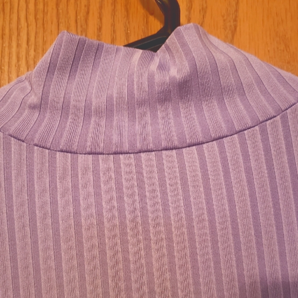 Lilac colored ribbed turtle neck bodycon mini dress
